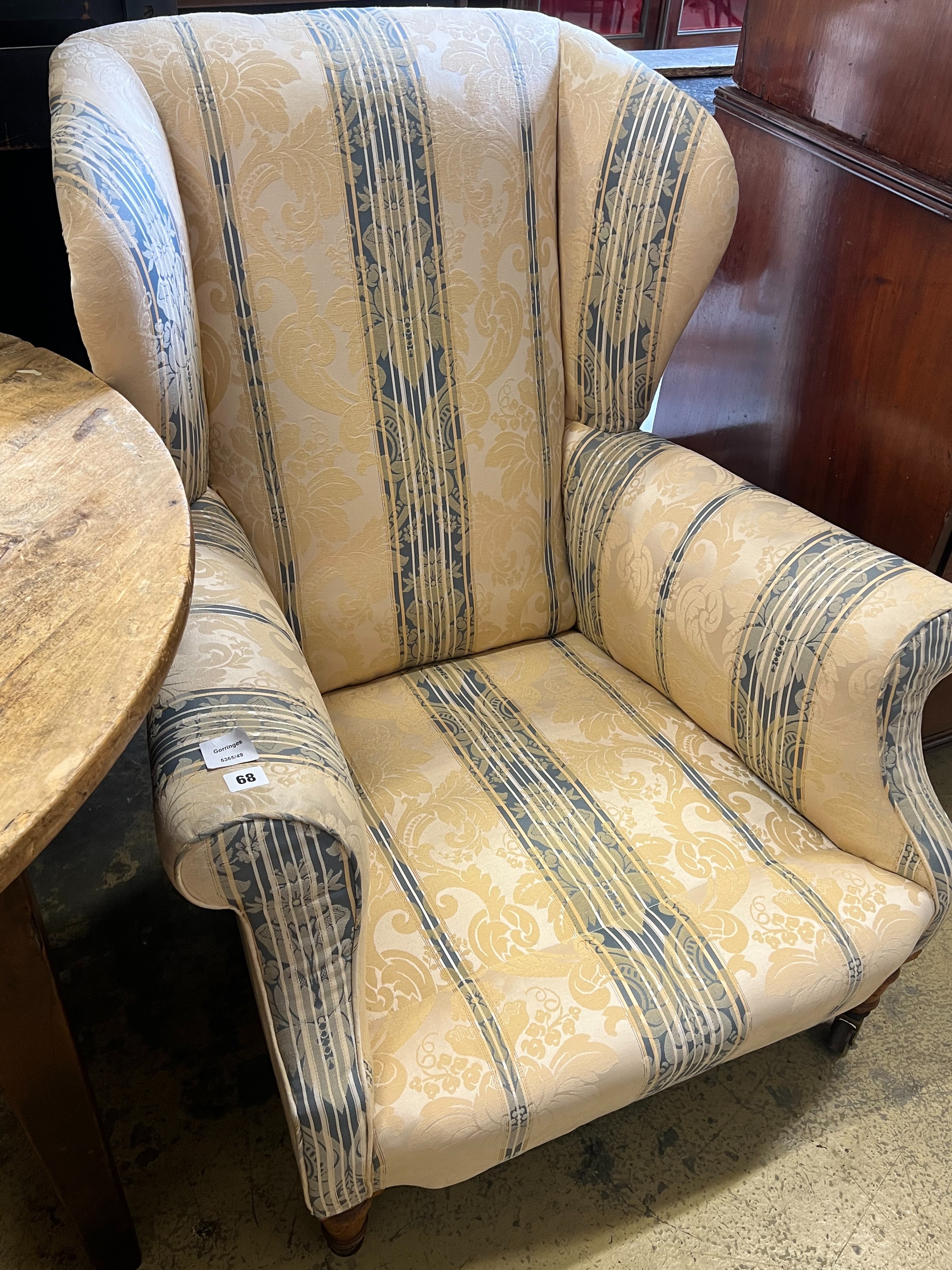 A late Victorian oak armchair